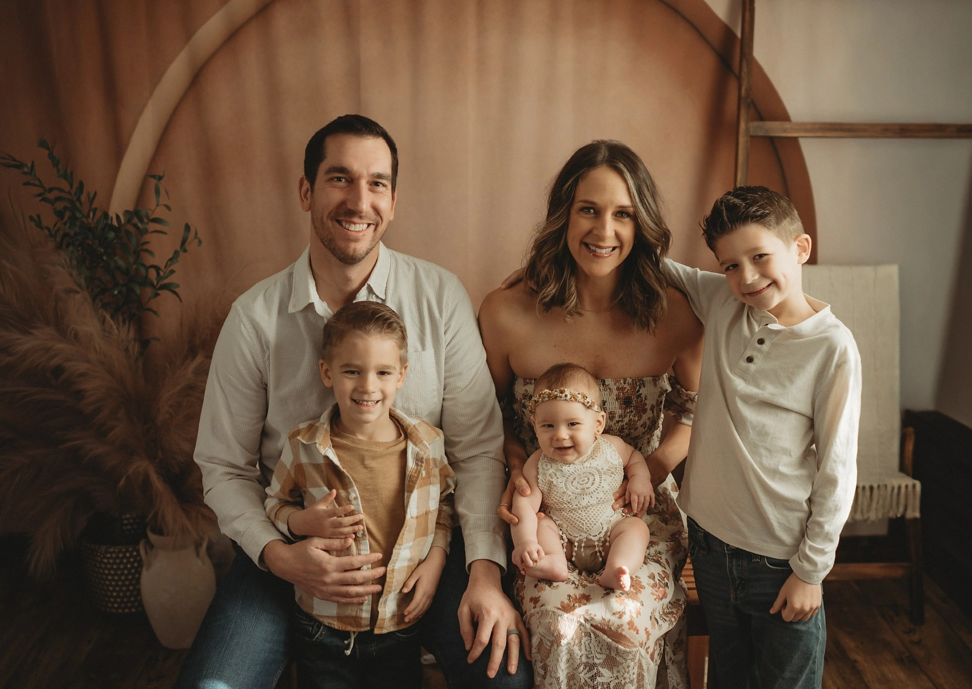 Brent and Emily Rohling with their children, owners of Dandurand Drugstore in Wichita, KS