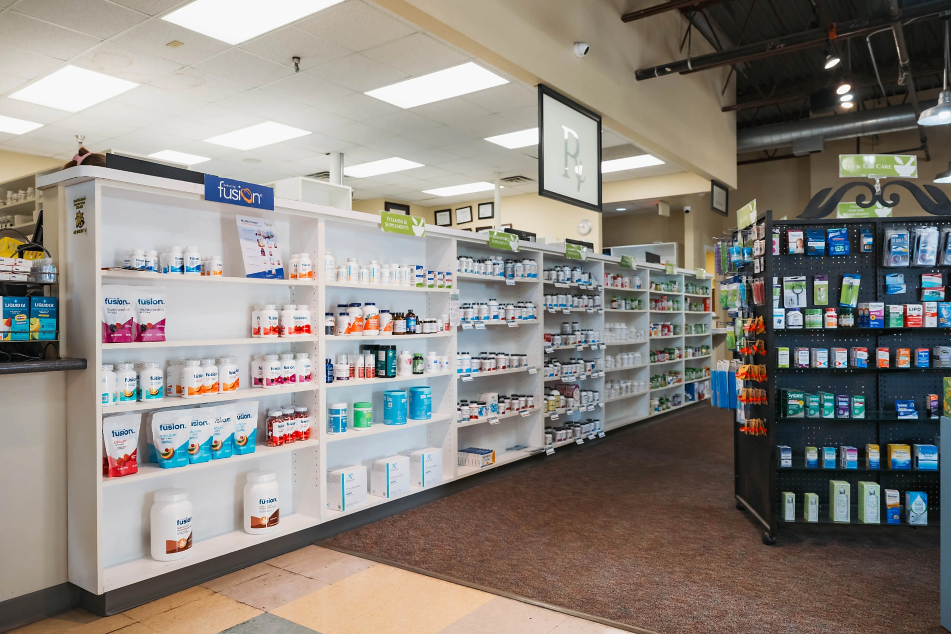 Practitioner-grade vitamins and supplements on the shelves at Dandurand
