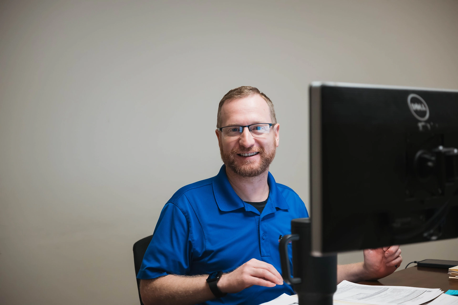 Dandurand team member working at a computer