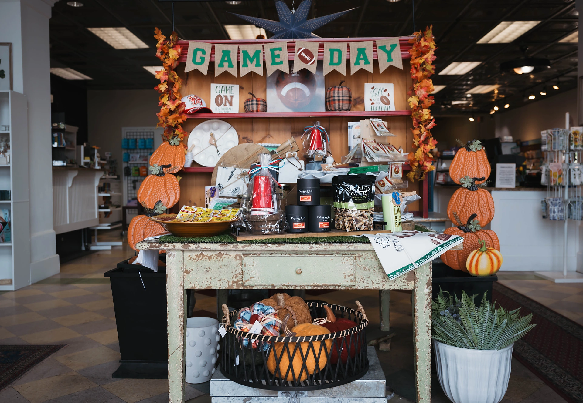 Seasonal boutique display with Pickwick & Trapp Candles and gifts at Dandurand Drugstore in Wichita, KS