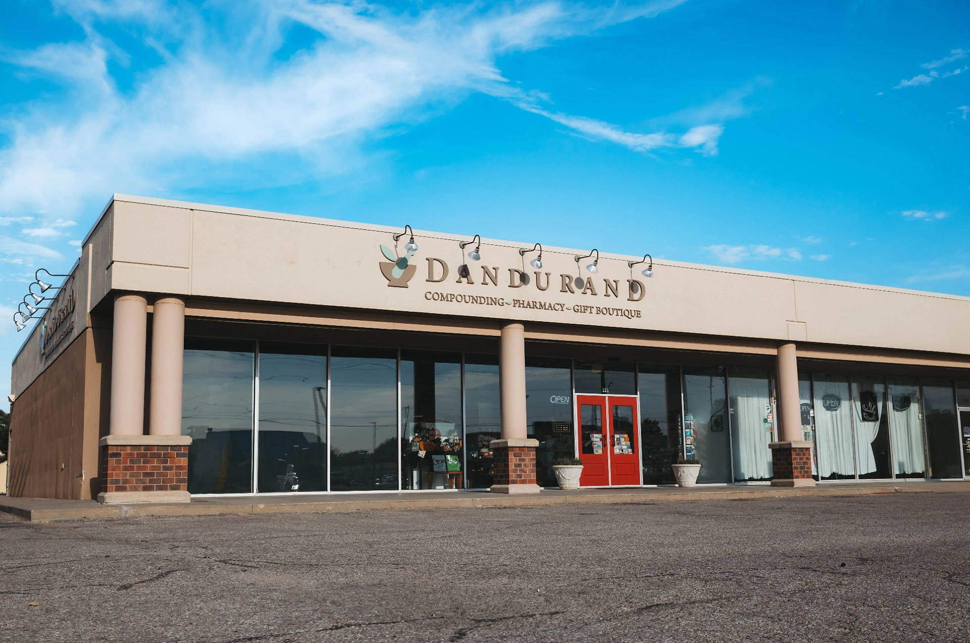 Dandurand West pharmacy and gift boutique storefront at 21st and Ridge Road in Wichita, KS